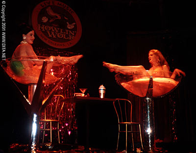 Dita Von Teese and Catherine D'Lish in duelling glasses, TeaseOrama 2001. (Supplied)